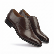 Angled view of dark brown leather Derby shoes