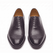 Front view of dark brown leather lace-up dress shoes