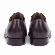 Back view of dark brown leather lace-up dress shoes