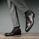 eggplant wholecut brogue shoes close up detail