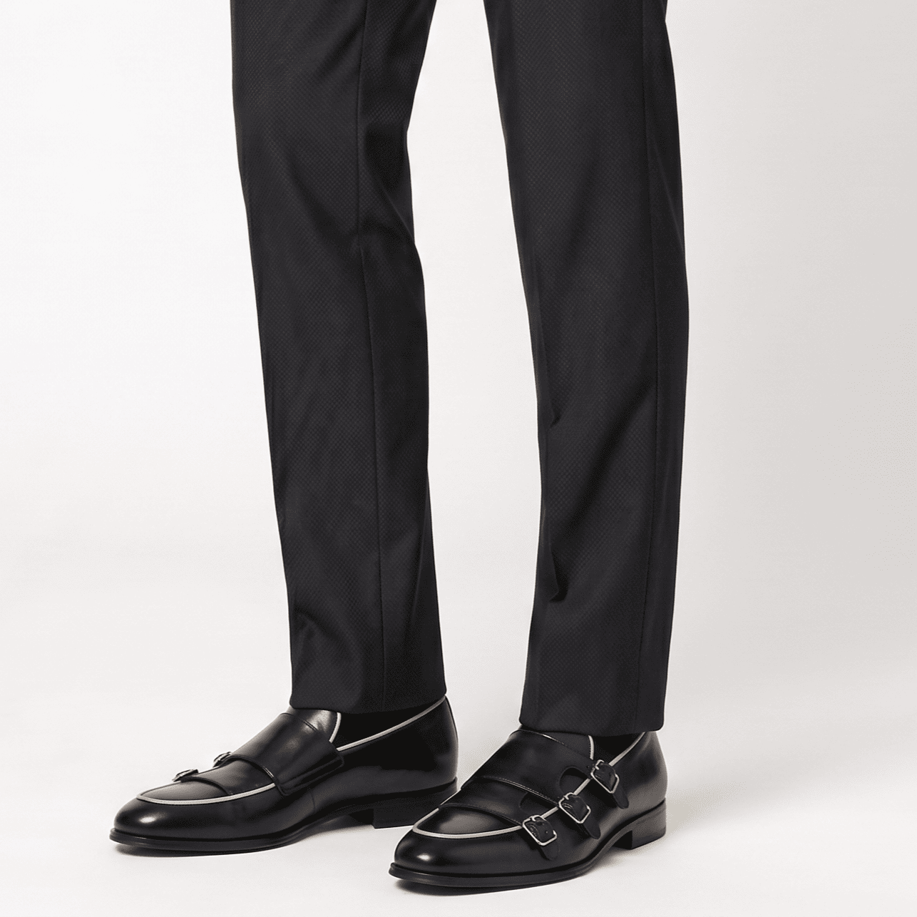 Men wearing black leather monk strap formal shoes with trousers