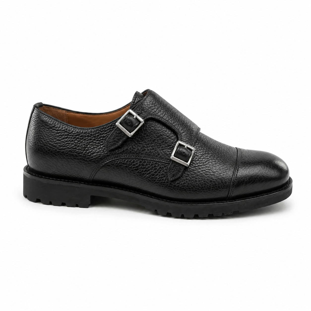 Side view of black leather double monk strap shoe