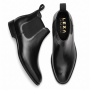 Black leather Chelsea boots pair top and side view