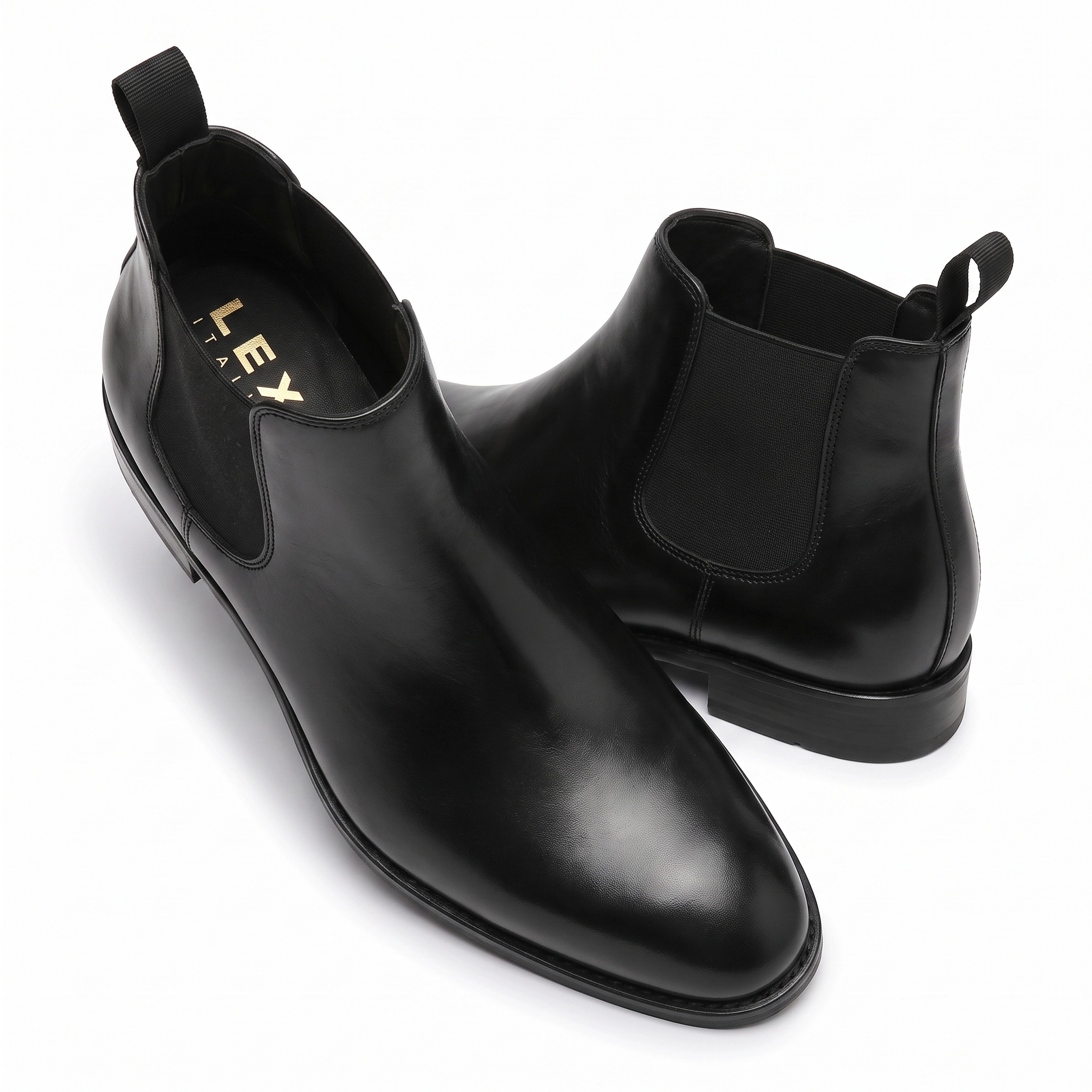 Black leather Chelsea boots angled pair view