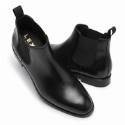 Black leather Chelsea boots angled pair view
