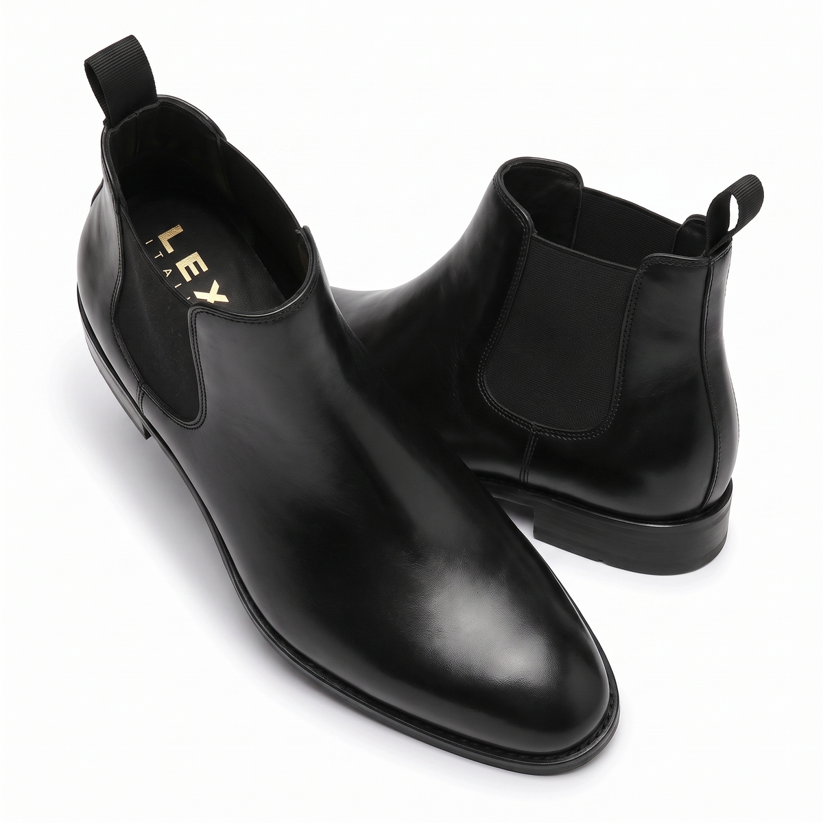 Black leather Chelsea boots angled pair view