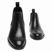 Black leather Chelsea boots front and side view