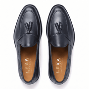 Top view of black leather horsebit loafers for men
