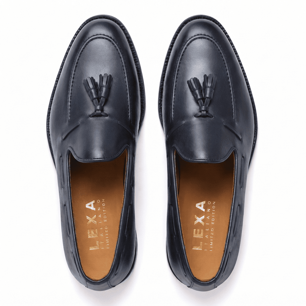 Top view of black leather horsebit loafers for men