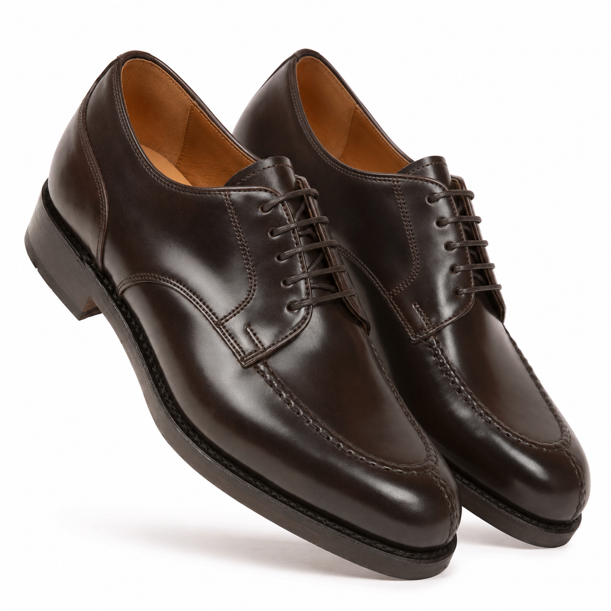 Angled pair of dark brown leather Derby shoes for men