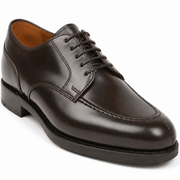 Side view of dark brown leather lace-up Derby dress shoe