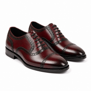 Burgundy leather brogue Oxford shoes for men with decorative perforated detailing