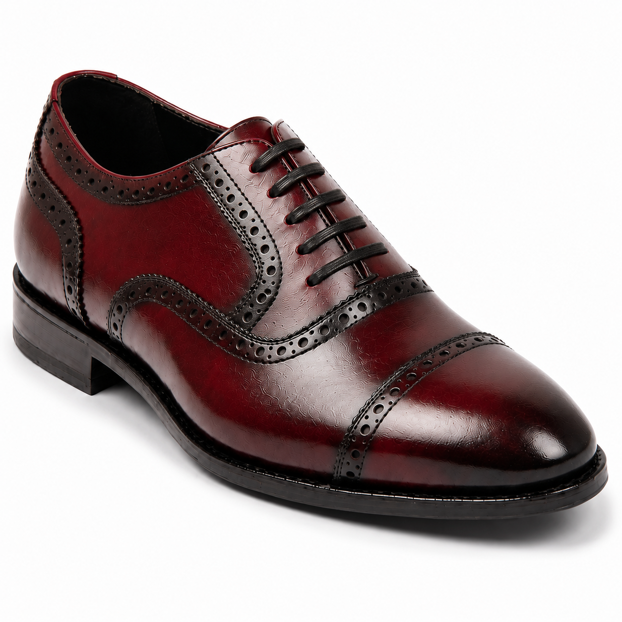 Front angled view of burgundy leather brogue Oxford shoes with brogue detailing