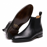 Black leather Chelsea boot with brown leather sole