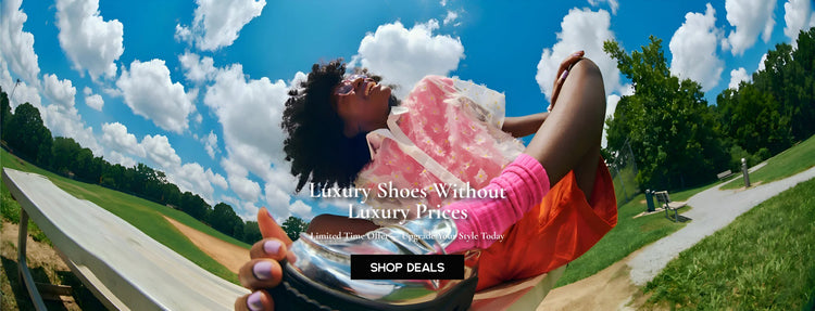 Woman relaxing outdoors wearing fashionable luxury shoes under a bright blue sky