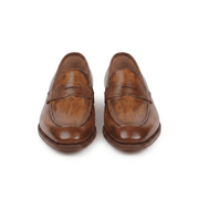 Front view of brown leather penny loafers for men