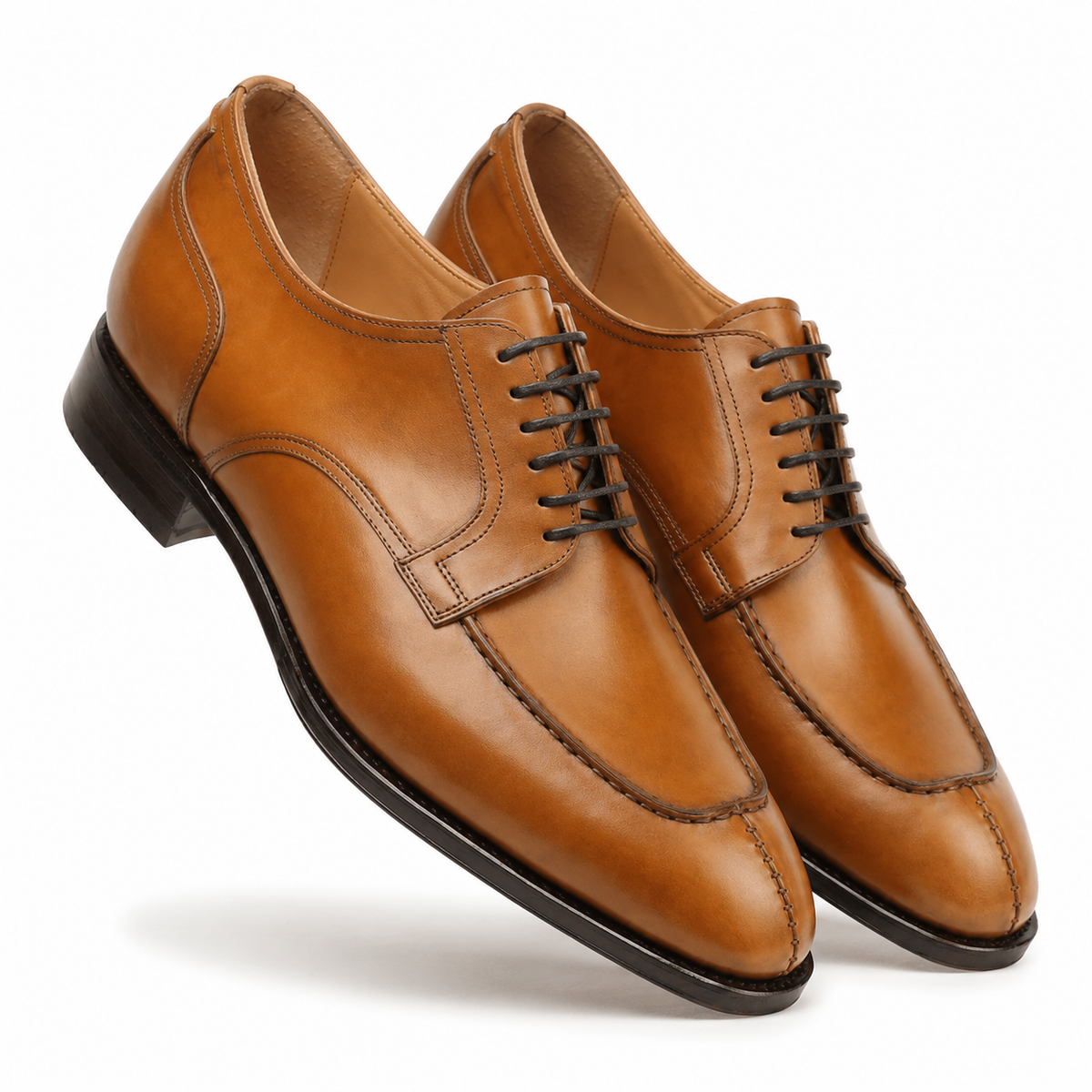 Pair of brown leather Oxford shoes for men in angled view