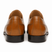 Brown leather Oxford shoes for men viewed from the back