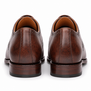 Back view of brown leather brogue shoes