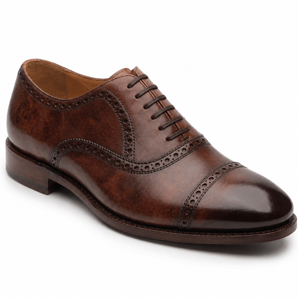 Side view of brown leather brogue dress shoe