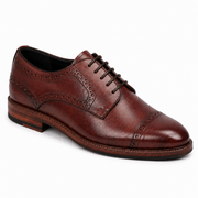 Side view of premium brown leather brogue shoes