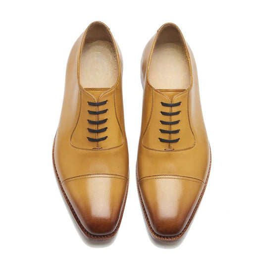 Top view of almond tan leather oxford shoes with closed lacing