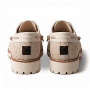 Back view of the shoes showing the leather lace wrap-around detail and the heavy-duty off-white rubber heel.