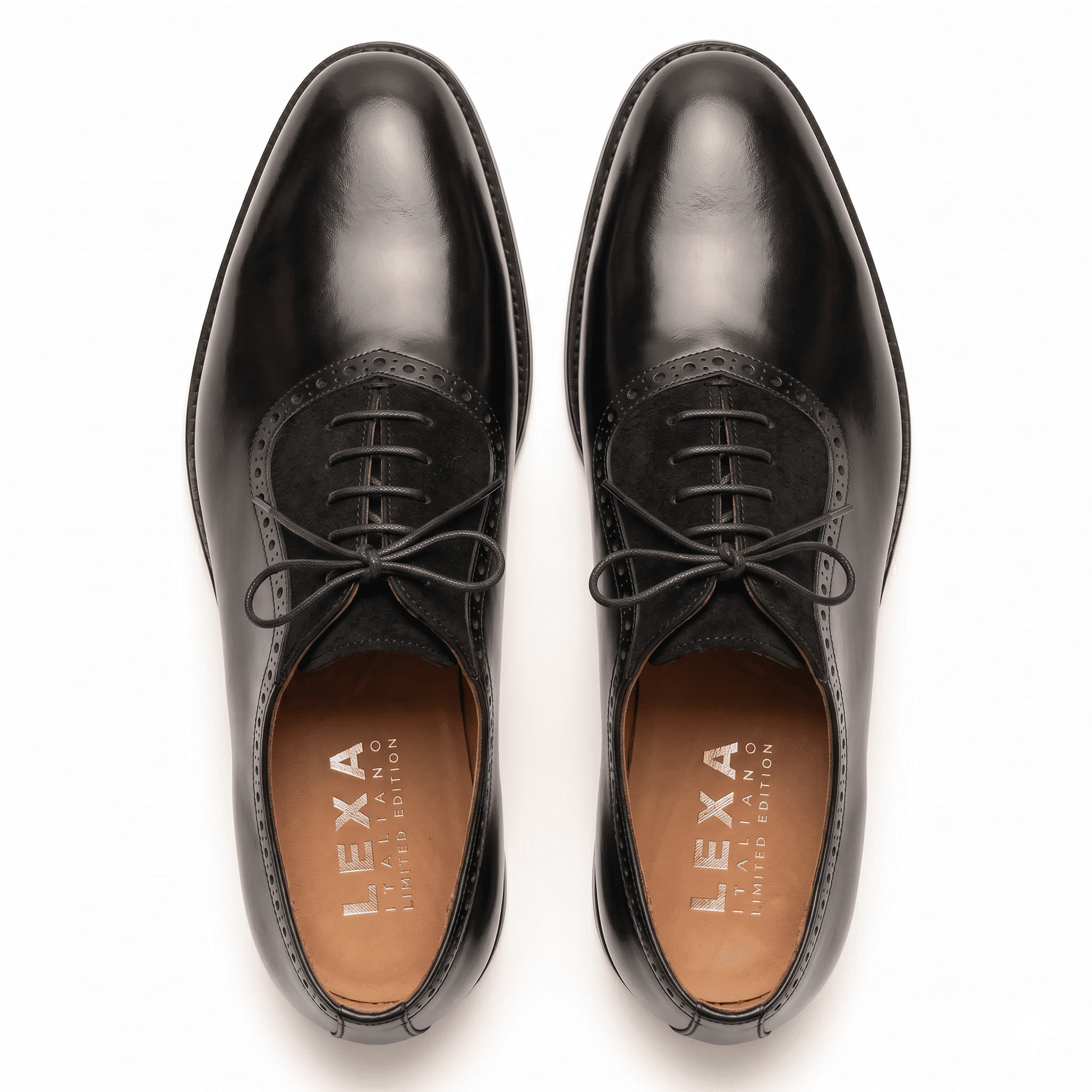 Overhead view of black formal Oxfords showing the almond toe shape, waxed laces, and tan leather interior lining.