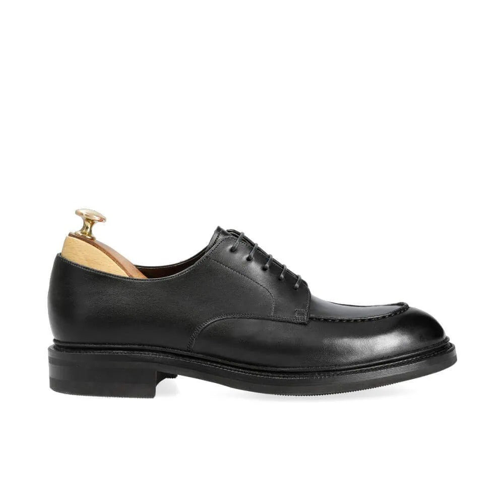 Side profile of black leather Derby formal shoes for men