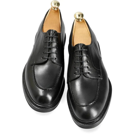 Top view of black leather Derby shoes for men