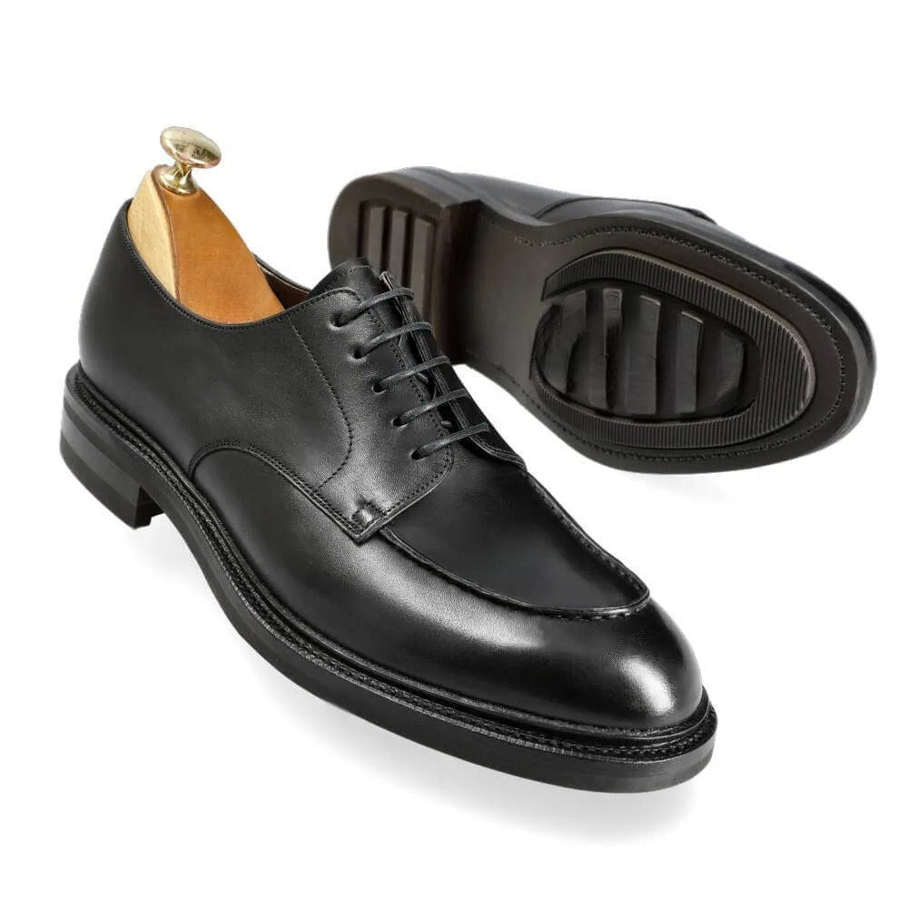 Angled view of black leather Derby formal shoes for men