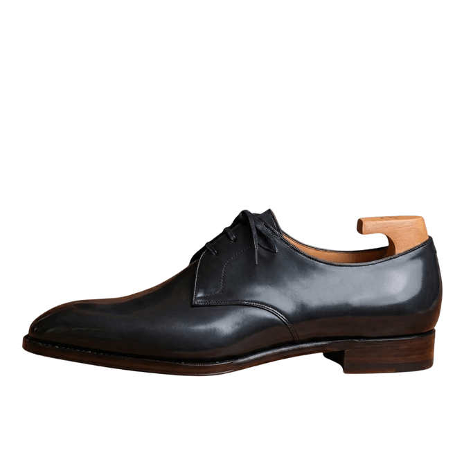 black leather formal shoe side view premium men footwear