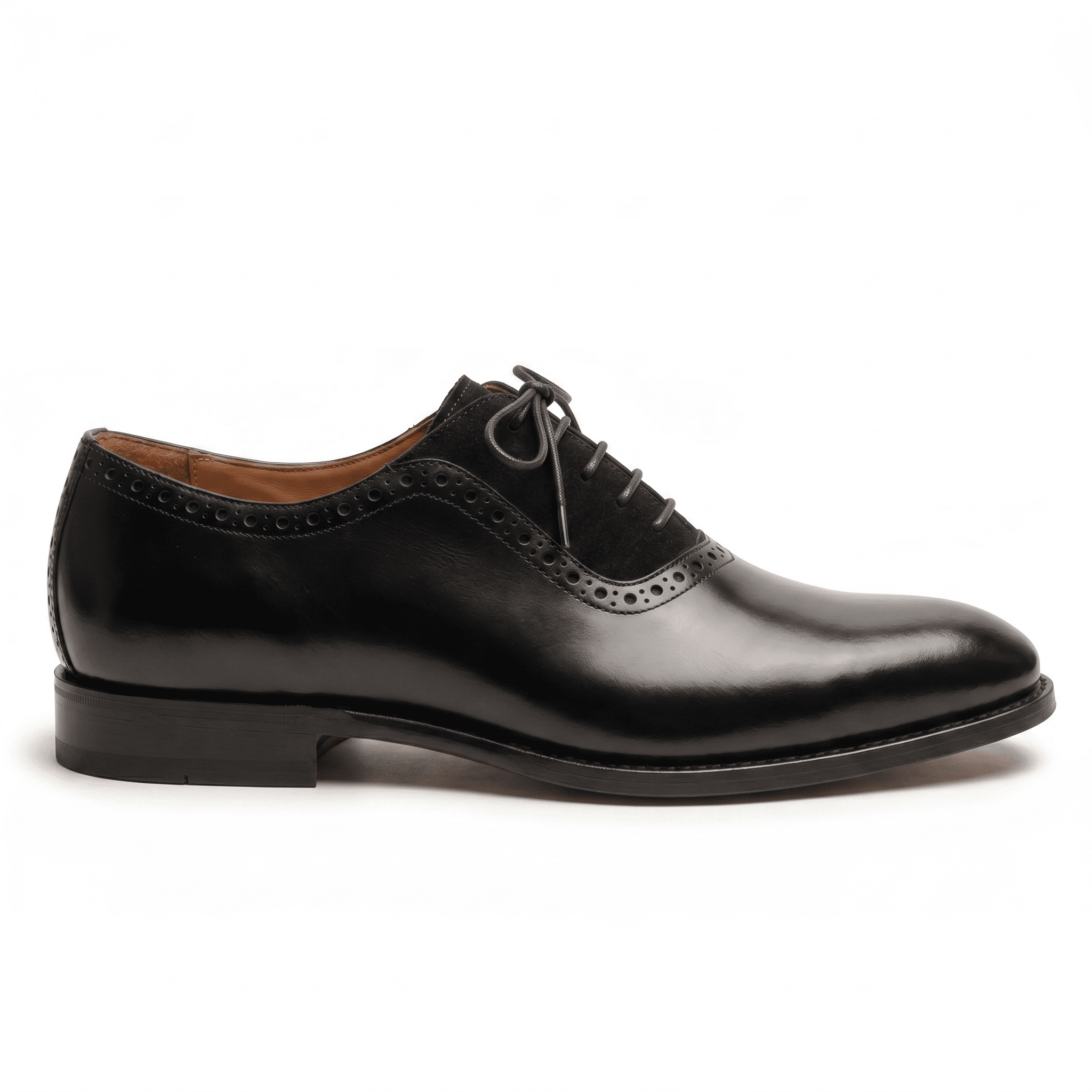 Crisp side profile of the shoe showcasing the low-profile sole and the elegant silhouette of the suede-panel design.