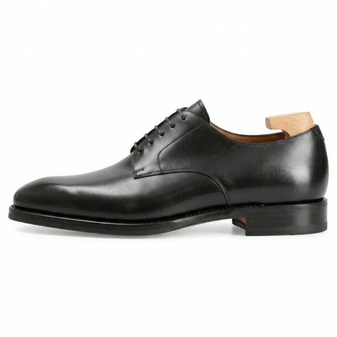 Side profile of black leather Oxford formal shoes