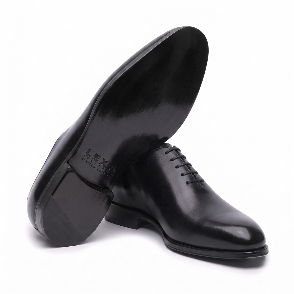 Bottom sole view of premium black leather Oxford shoes for men highlighting the durable outsole and quality construction