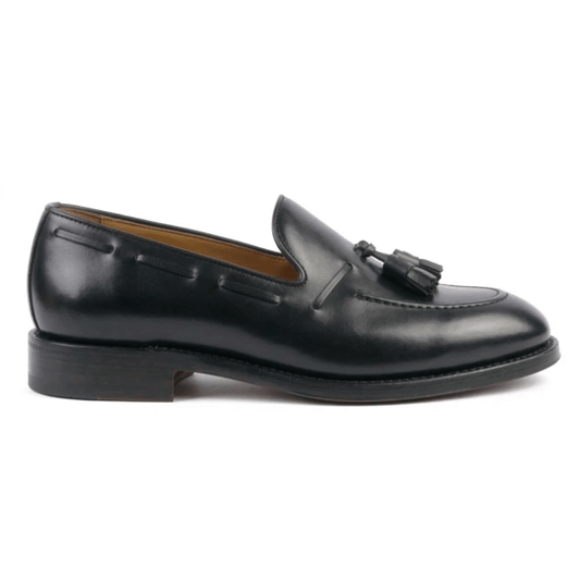 black leather tassel loafer side view elegant slip on shoe