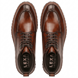 Top view of men’s brown leather lace-up boots showing inner lining