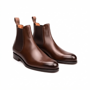 Brown leather Chelsea boots for men handcrafted from premium genuine leather with elastic side panels and a sleek formal design