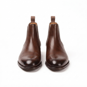 Front view of brown genuine leather Chelsea boots for men featuring a sleek almond toe and elegant craftsmanship.