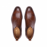 Top view of brown genuine leather Chelsea boots for men showcasing the premium finish and handcrafted construction.