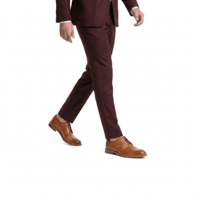 man walking wearing brown leather formal shoes office style