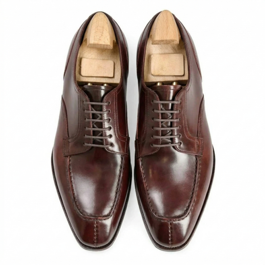 Top view of burgundy leather Oxford shoes for men