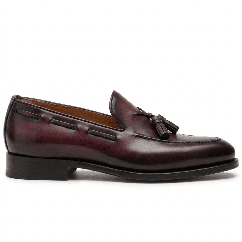 Side profile of mens burgundy leather tassel loafer