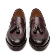 Back view of mens burgundy leather tassel loafers showing heel