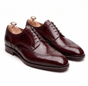 Burgundy Wingtip Brogue Derby leather shoes for men angled side view