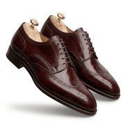 Burgundy leather wingtip brogue derby shoes side profile