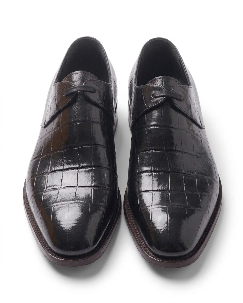 Side view of brown leather wingtip oxford shoes for men with brogue detailing formal footwear