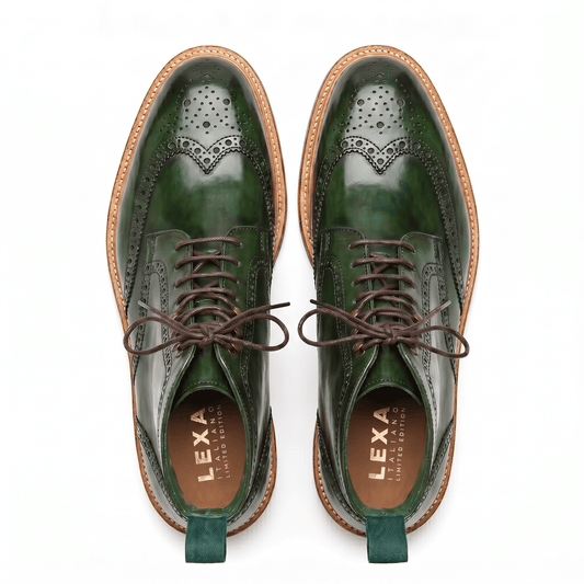 Overhead view of green leather dress boots showing the intricate wingtip perforations and matching green pull tabs.