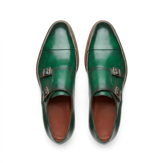 Top view of green double monk strap formal shoes with sleek almond toe design
