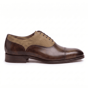 Pair of handcrafted brown and tan leather Oxford shoes with elegant almond toe